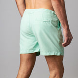 Back view of Tailored Swim Shorts - Summit Green, showcasing classic cut swimwear designed for pool or city adventures.