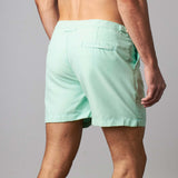Back view of Tailored Swim Shorts - Summit Green, showcasing classic cut swimwear designed for pool or city adventures.