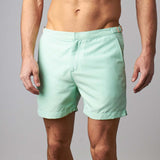 Tailored Swim Shorts - Summit Green featuring a classic cut design, perfect for poolside or city adventures.