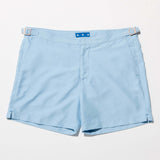 Tailored Swim Short - Sea in light blue, versatile for poolside or city adventures.